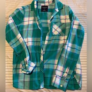 Lightly worn flannel. Super cute!